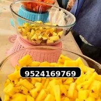Fresh Fruit Counter for Wedding Reception Freshly prepared fruit salad bowls for wedding event